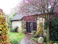 Gemütliches Einfamilienhaus in Herford-Herringhausen mit Sauna,  Freisitz, Wintergarten und einem großzügigen Garten zur Größe von ca. 1.309 m².